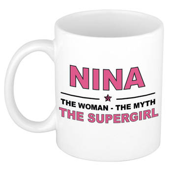 Naam cadeau mok/ beker Nina The woman, The myth the supergirl 300 ml - Naam mokken