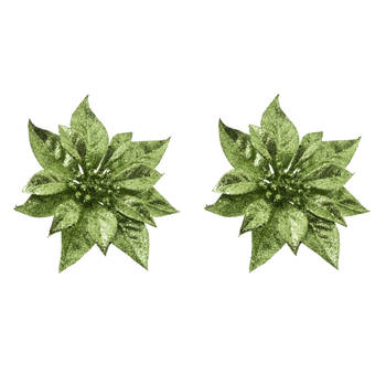 2x stuks decoratie bloemen kerstster groen glitter op clip 18 cm - Kunstbloemen