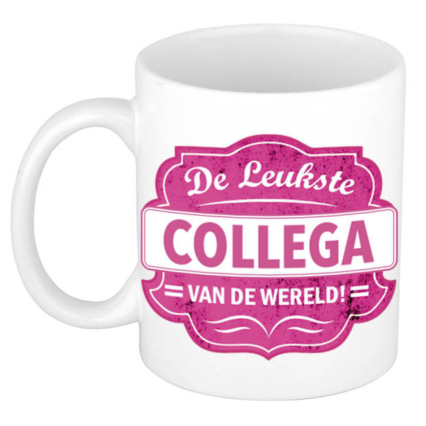 De leukste collega cadeau mok / beker wit met roze embleem 300 ml - feest mokken