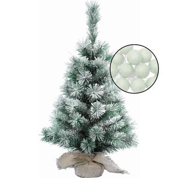 Mini kerstboom besneeuwd met verlichting - in jute zak - H60 cm - lichtgroen - Kunstkerstboom