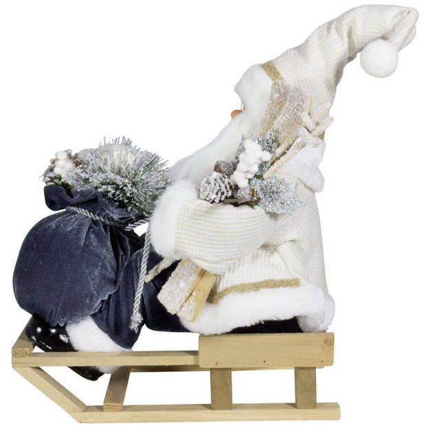 Kerstman beeld - H45 cm - wit - zittend op slee - kerstpop - Kerstman pop