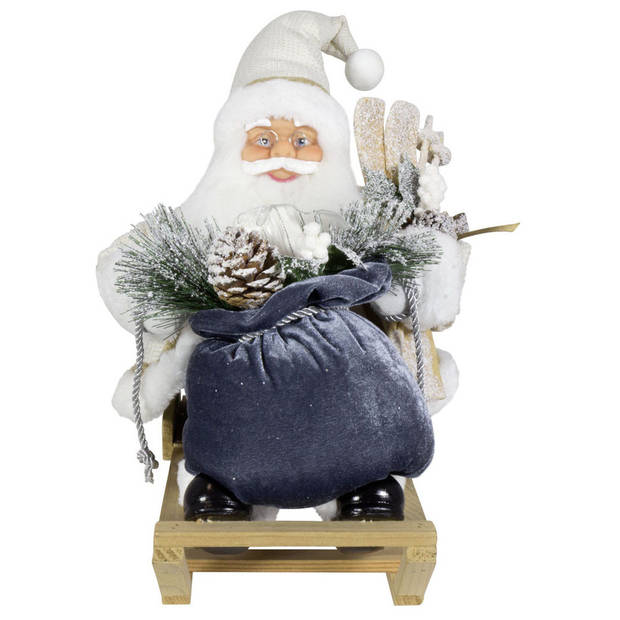 Kerstman beeld - H45 cm - wit - zittend op slee - kerstpop - Kerstman pop