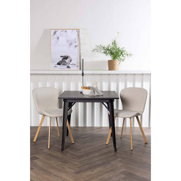 Tempe eethoek tafel zwart en 2 Lilja stoelen beige.