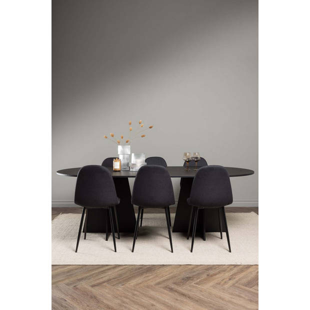 Bootcut eethoek tafel zwart en 6 Polar stoelen zwart.