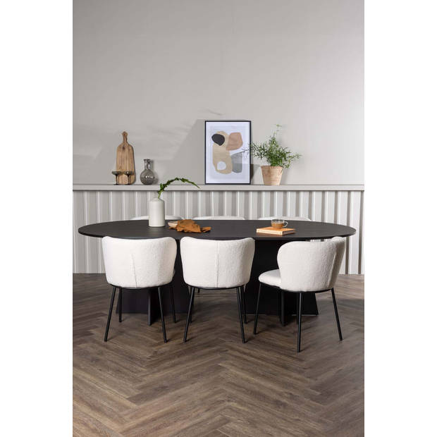 Bootcut eethoek tafel zwart en 6 Edina stoelen wit.