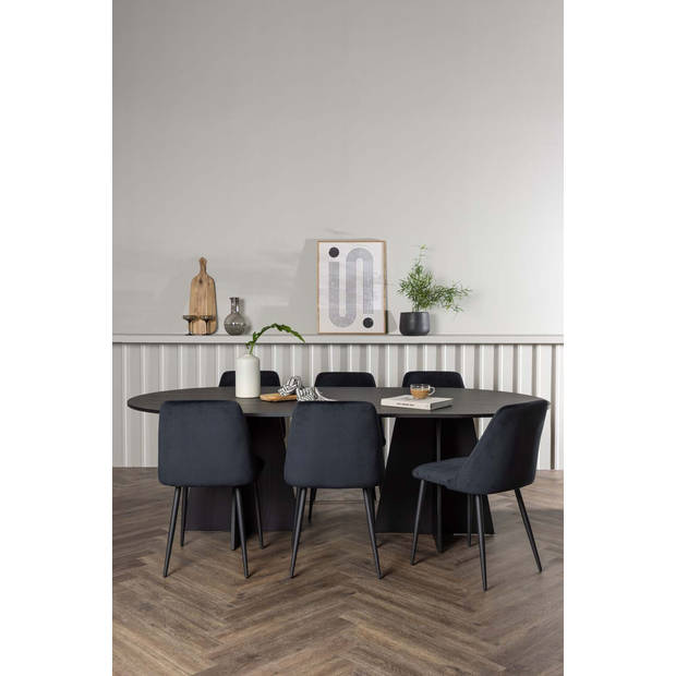 Bootcut eethoek tafel zwart en 6 Night stoelen zwart.