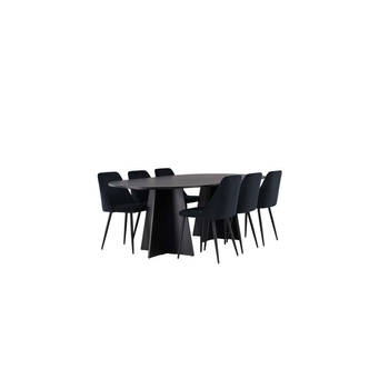 Bootcut eethoek tafel zwart en 6 Night stoelen zwart.