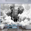 Fotobehang - Elephant in the Clouds Black and White - Vliesbehang